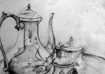 A still life setup of a silver pouring vase and other silver objects.