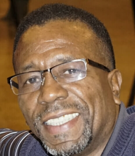 Profile Photo of the artist Anthony H Brown smiling with glasses on